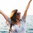 Happy woman near beach