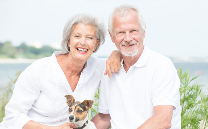 Elderly couple with a dog