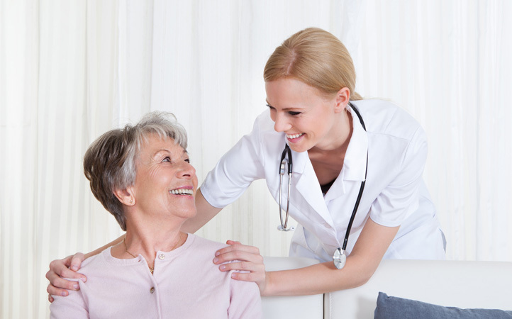Doctor smiling with patient
