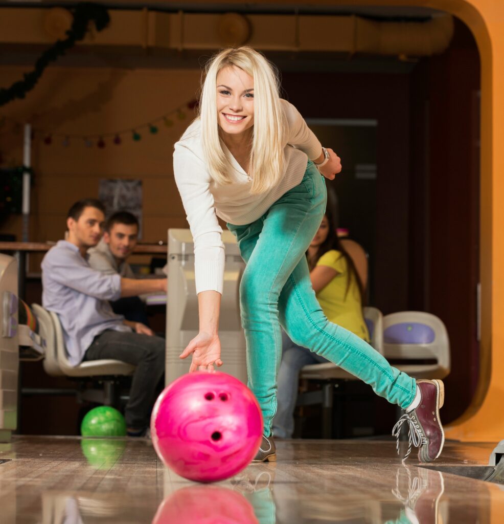 girl doing bowling
