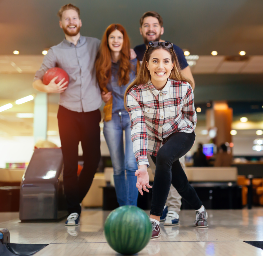 group of people doing bowling