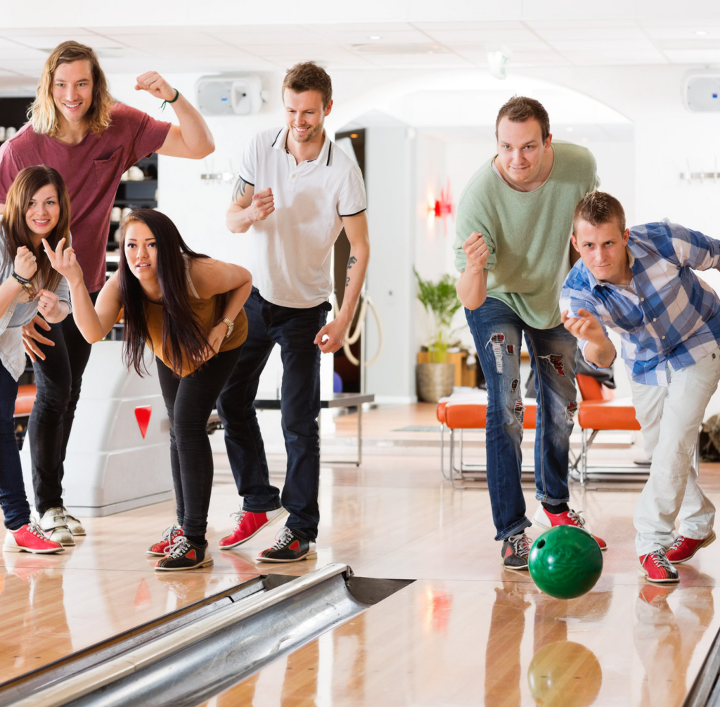 two groups competing at bowling