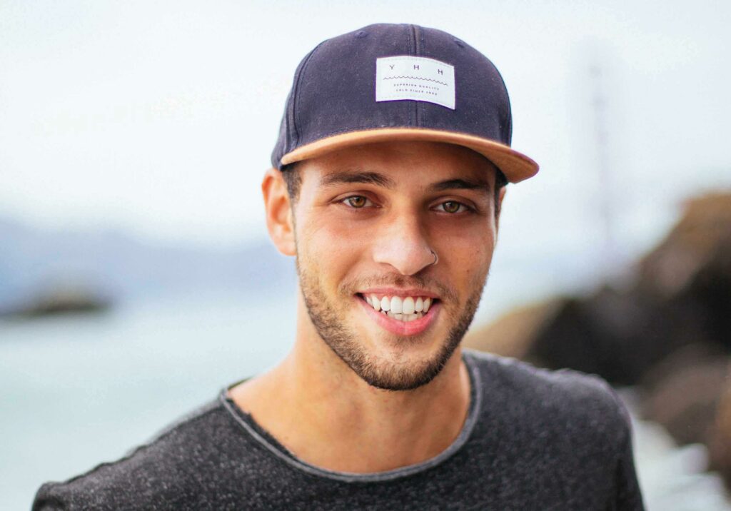 man in a cap smiling